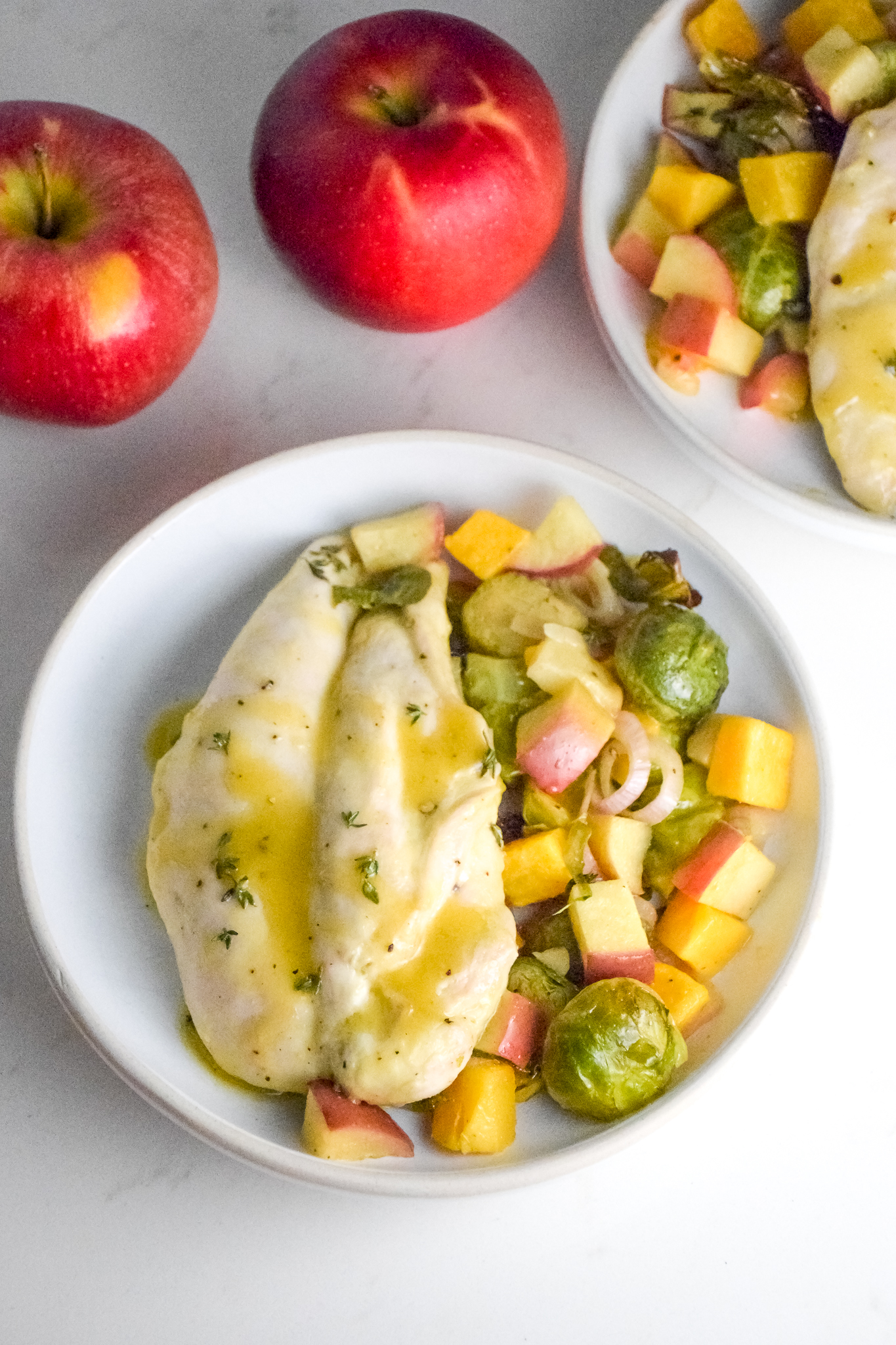 This Chicken with Apples and Veggies in a Maple Dijon Sauce is an easy, quick, healthy meal that is delicious and filling!